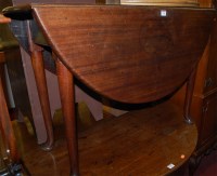 Lot 1194 - A George III mahogany padfoot dropleaf dining...