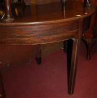 Lot 1195 - A George III mahogany demi-lune side table
