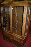 Lot 1204 - An Old charm moulded oak double door lead...