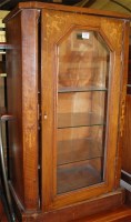 Lot 1206 - A Victorian figured walnut single door glazed...