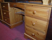 Lot 1217 - A modern pine round cornered ledgeback...