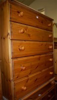 Lot 1228 - A modern pine round cornered chest of five...