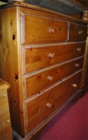 Lot 1229 - A modern pine round cornered chest of two...