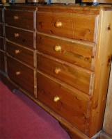 Lot 1231 - A modern pine round cornered ledgeback...