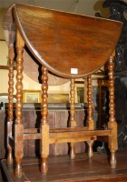 Lot 1238 - An early 20th century oak bobbin turned...