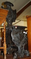 Lot 1239 - A Continental low relief carved and ebonised...