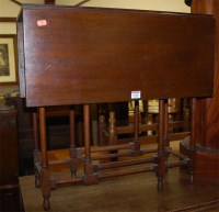 Lot 1246 - An Edwardian walnut spider leg Sutherland table