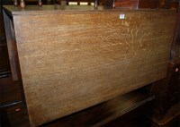Lot 1248 - An early 19th century mahogany dropleaf dining...
