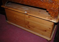Lot 1251 - A modern pine round cornered hinged blanket box