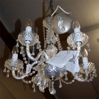 Lot 1260 - A contemporary cut crystal five light hanging...