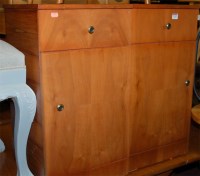 Lot 1270 - A pair of faux walnut single door bedside...