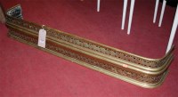 Lot 1283 - A late Victorian pierced brass fire fender