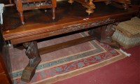 Lot 1294 - A large Continental carved oak drawer leaf...