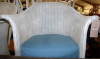 Lot 1296 - A pair of Lloyd Loom white painted wicker...