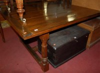 Lot 1302 - A stained pine plank-top farmhouse refectory...