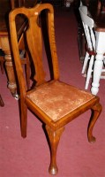 Lot 1309 - A set of four Queen Anne style walnut...