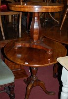 Lot 1317 - A 19th century elm circular pedestal tripod...