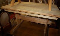 Lot 1329 - A pine trestle end kitchen table; together...