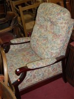 Lot 1358 - A modern upholstered showframe armchair