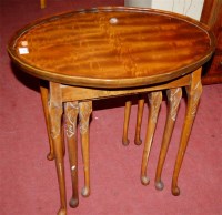 Lot 1383 - Two walnut nests of three occasional tables