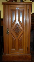 Lot 1386 - A late Victorian walnut ledgeback single door...