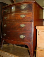 Lot 1392 - A mahogany bowfront chest of four long...