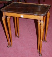 Lot 1397 - A walnut nest of two occasional tables