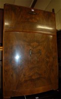 Lot 1401 - A 1930s figured walnut cocktail cabinet,...