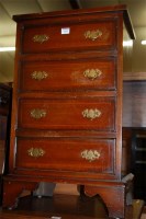 Lot 1410 - A reproduction mahogany chest of four long...