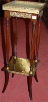 Lot 1415 - A Louis XVI style French mahogany and brass...
