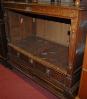 Lot 1421 - An antique moulded oak double door side...