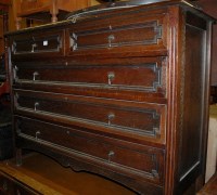 Lot 1423 - An early 20th century geometric moulded oak...