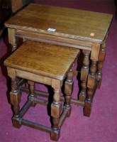 Lot 1425 - A moulded beech nest of three occasional tables
