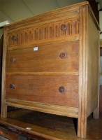 Lot 1432 - A moulded light oak chest of three long...