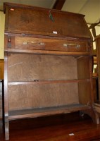 Lot 1434 - An early 20th century oak slopefront single...