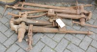 Lot 1457 - A collection of cast iron vices (possibly for...