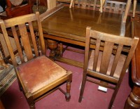 Lot 1330 - A 1930s oak drawleaf dining table; together...