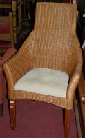 Lot 1354 - A modern wicker conservatory chair, having...