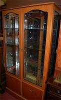 Lot 1419 - A reproduction walnut effect double door...