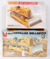 Lot 1576 - Caterpillar 1/25th scale plastic kit group, 2...
