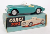 Lot 1628 - Corgi Toys, 302 MGA sports car, dark metallic...