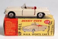 Lot 1967 - Dinky, 113 M.G.B. sports car, cream, red...