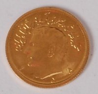 Lot 252 - Iran, 1976 gold half pahlavi, bust of Shah,...