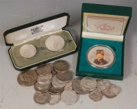 Lot 254 - Mixed lot of silver and other coins to include,...