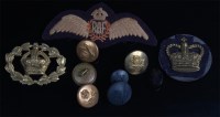 Lot 301 - A small collection of military badges and...