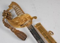 Lot 310 - An Elizabeth II Royal Naval dress sword, the...