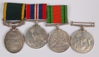 Lot 324 - A group of WW II medals to include Defence,...