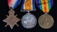 Lot 325 - A WW I trio to include 1914-15 Star, British...