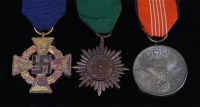 Lot 326 - A German Faithful Service medal, together with...