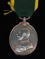Lot 329 - A Geo. V. Territorial Force Efficiency medal,...